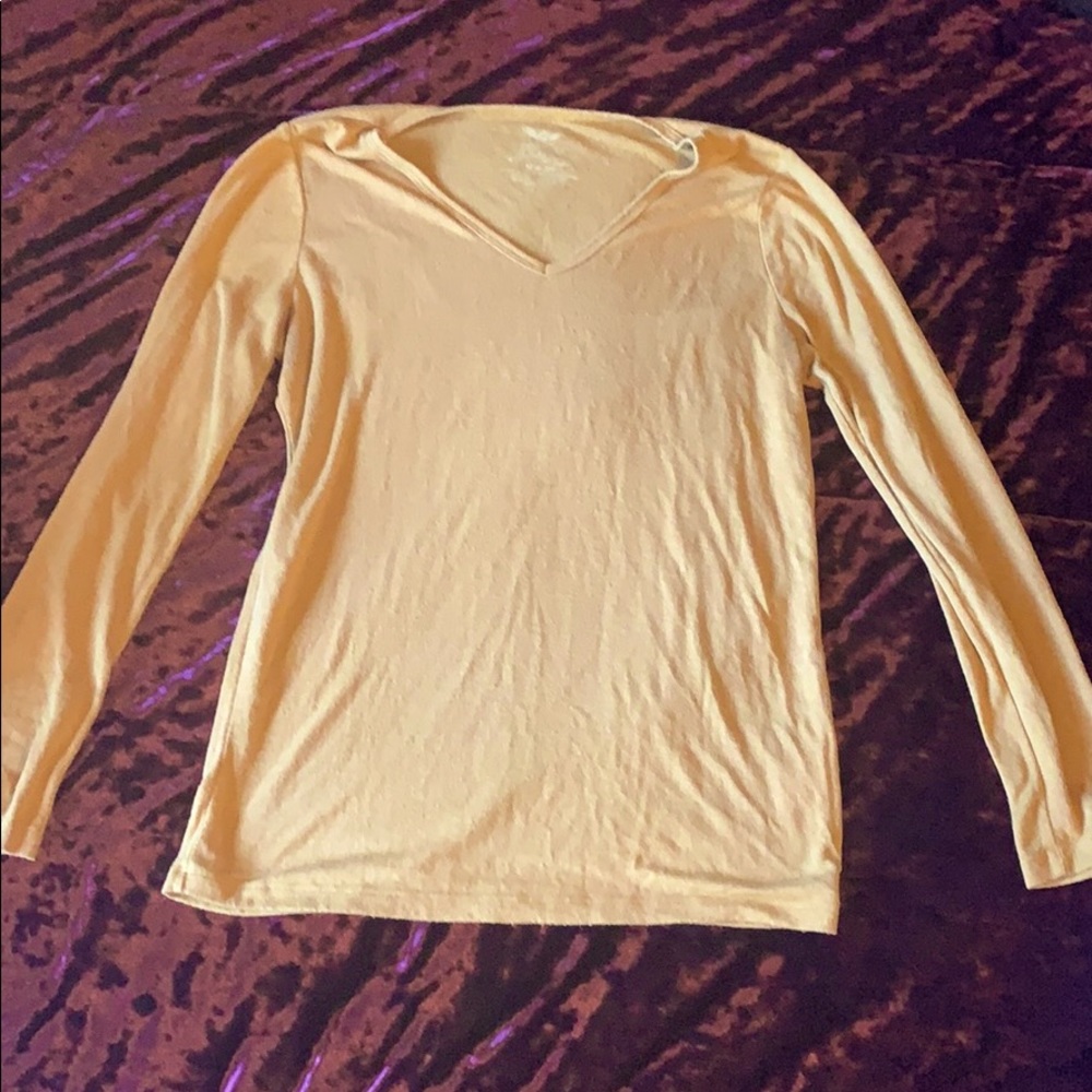 I am selling a yellow long sleeve cotton T-shirt.